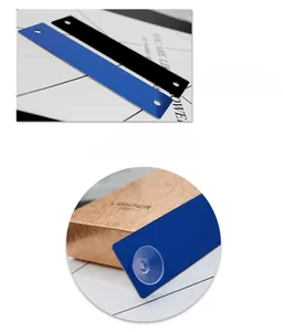 Close-up of dual-hole suction cups and blue stainless steel parking plate for cars