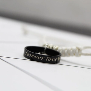 Couples stainless steel ring bracelet with forever love engraving and white woven rope