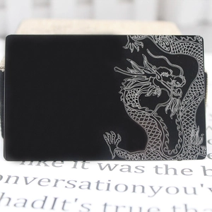 Matte black 0.2mm metal business card with engraved silver dragon design pattern