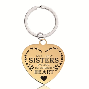 Golden heart keychain with engraved sisters message on stainless steel heart pendant