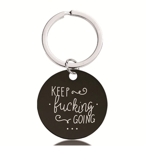 Inspirational black round stainless steel keychain with Keep Fucking Going engraving