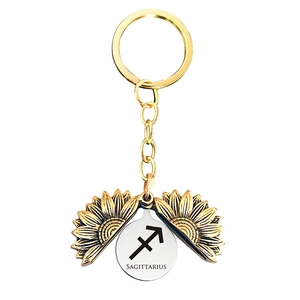 Detailed view of Sagittarius zodiac sunflower locket keychain in gold finish