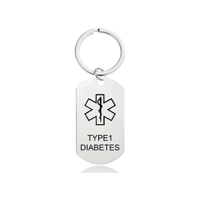 Detail view of Type 1 Diabetes medical alert keychain with Star of Life symbol on steel