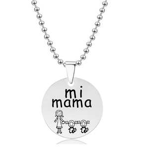 Detailed view of round stainless steel pendant with mi mama engraving and bead chain