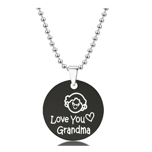 Detailed close-up of a stainless steel round pendant with Love You Grandma engraving