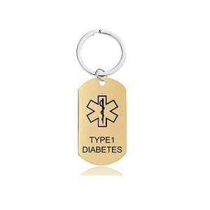 Detailed view of gold-plated medical alert dog tag for Type 1 Diabetes with Star of Life