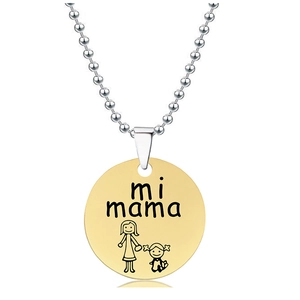 Detail of silver bead chain with gold pendant featuring 'mi mama' engraving and mother-child art
