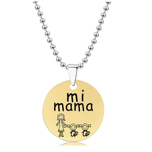 Macro detail of gold-plated pendant engraved with 'mi mama' and family sketch on ball chain