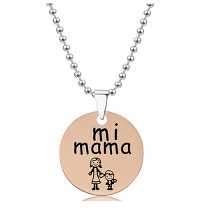 Detail of rose gold round pendant with mi mama engraving and silver bead chain