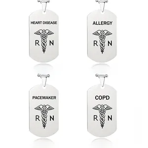 Detail view of medical alert dog tags featuring engraved heart disease and allergy symbols