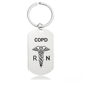 Detailed close-up of stainless steel medical keychain with COPD and RN engravings