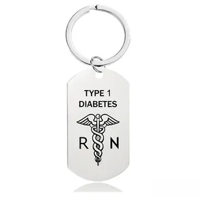 Polished silver keychain with Type 1 Diabetes engraving and medical snake staff symbol