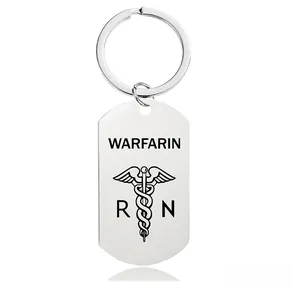 Close-up of stainless steel medical ID keychain featuring Warfarin alert and Caduceus logo