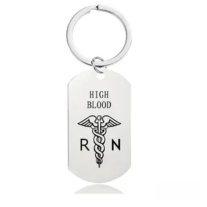 Detail of silver stainless steel medical alert keychain with High Blood and RN engraving