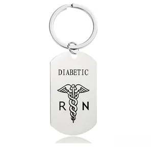 Macro shot of stainless steel medical keychain with Star of Life and Diabetic engraving