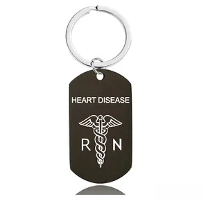 Black brushed metal medical keychain with Heart Disease engraving and caduceus symbol