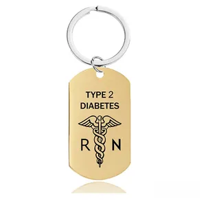 Golden rectangular medical ID keychain with Type 2 Diabetes engraving and snake caduceus symbol