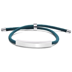 Detail of dark green woven rope bracelet with adjustable closure and polished metal plate