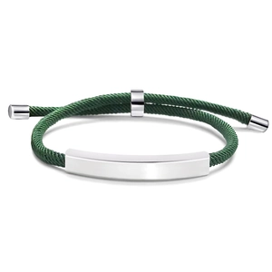 Detail of adjustable green woven strap with polished silver metal plate for engraving