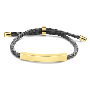 Macro detail of minimalist grey woven bracelet with adjustable gold bar for custom engraving