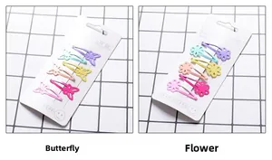 Detail of macaron candy color metal hair clips in butterfly and flower hollow designs