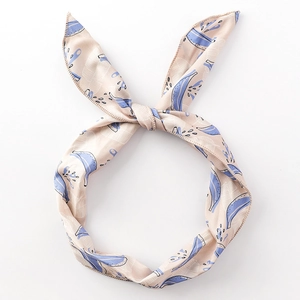 Tropical banana leaf print headband with bunny ear bow in pink and blue fabric