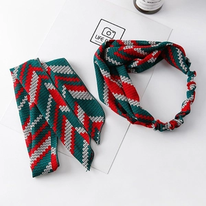 Knitted headband and scarf set featuring a green and red geometric zigzag wave pattern