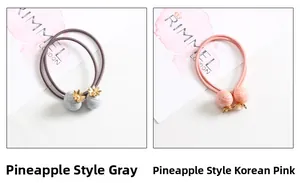 Gros plan d'élastiques à cheveux ananas gris et roses avec double cordon élastique