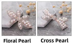 Close-up of rose gold hair clips with sparkling crystals and elegant white pearls