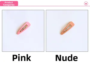 Close-up of matte pink and nude BB hair clips showing smooth texture and metal base