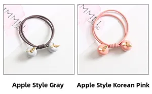 Détails des chouchous élastiques avec breloque pomme émaillée et pendentif feuille