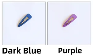 Close-up of matte finish dark blue and purple teardrop-shaped BB hair clips