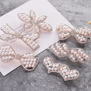 5-piece gold hair clip set with white pearls and rhinestones in Korean style bow design