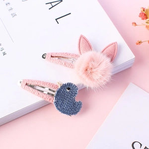 Joli lot de deux barrettes pour enfants avec oreilles de lapin roses et poussin tricoté