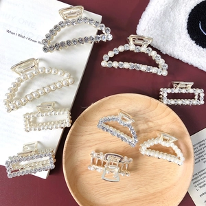 Luxury gold hair claws with pearls and rhinestones in various elegant shapes