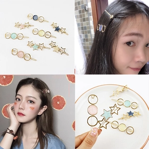 Star and circle geometric hair pins set in gold metal with pastel resin colors