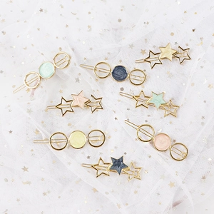 Set of 7 colorful candy enamel hair clips with star and circle patterns on gold metal