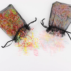Elastic disposable hair ties in colorful stripes and macaron shades with mesh pouches