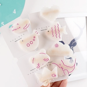 Charming set of 7 cream acrylic hair clips featuring purple line art animal shapes