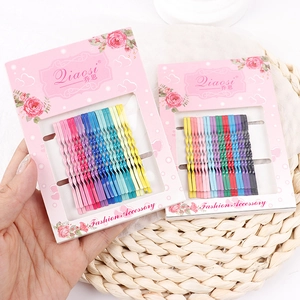 Set of colorful wavy macaron hair clips for women with matte finish on paper card