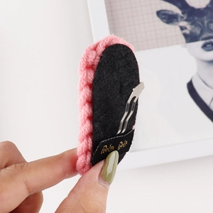 Handmade pink wool woven hair clip with silver metal BB clip and decorative black tag