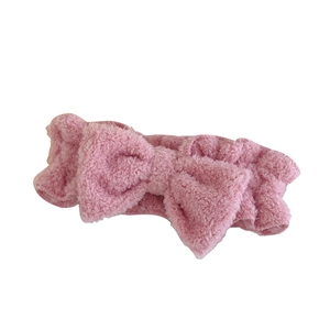 Pink soft plush bow headband for face washing and skincare with wide elastic band