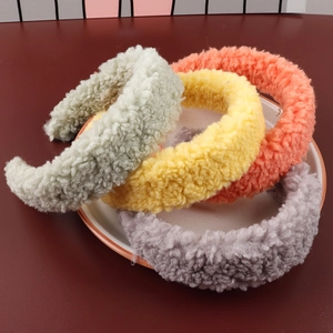 Detailed texture of thick teddy fleece headbands in assorted candy colors for autumn
