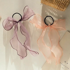 Elegant organza bow hair scrunchies set in pink and lilac with wavy edges for women