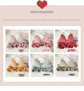Close-up of soft velvet bow headbands in six pastel colors for facial washing and spa