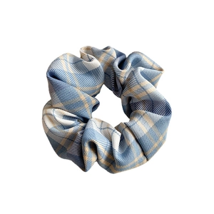 Classic blue plaid scrunchie with JK uniform fabric texture for hair styling