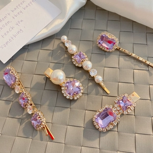 Elegant purple rhinestone and pearl hair clip set with gold metal finish for women
