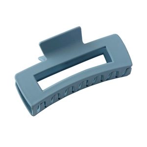 Matte light blue rectangular claw clip with hollow design and sleek spring for women