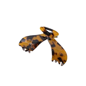 Large tortoiseshell acetate hair claw clip with vintage amber pattern for elegant hair styling