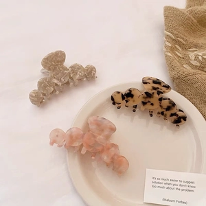 Three-piece set of French acetate hair claws in marble pink, leopard, and gray patterns